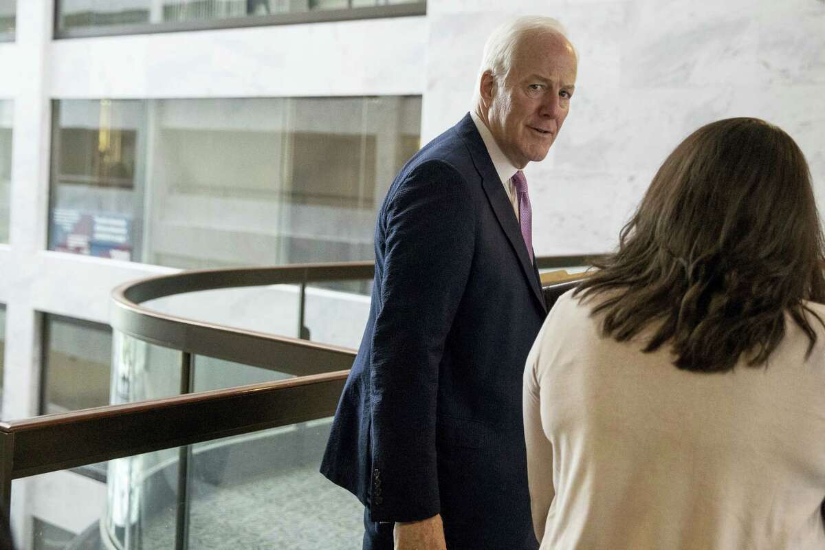 Senate Majority Whip John Cornyn of Texas makes his way to the Capitol Building on Capitol Hill in Washington on July 17, 2017. The Senate has been forced to put the Republican’s health care bill on hold for as much as two weeks until Sen. John McCain, R-Ariz., can return from surgery.