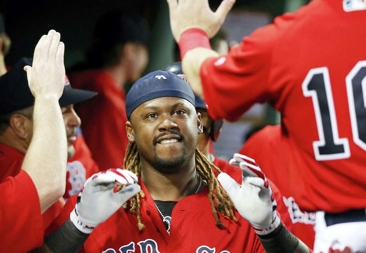 Boston Red Sox’s Hanley Ramirez celebrates his two-run home run during the third inning of a baseball game against the New York Yankees in Boston, Friday.