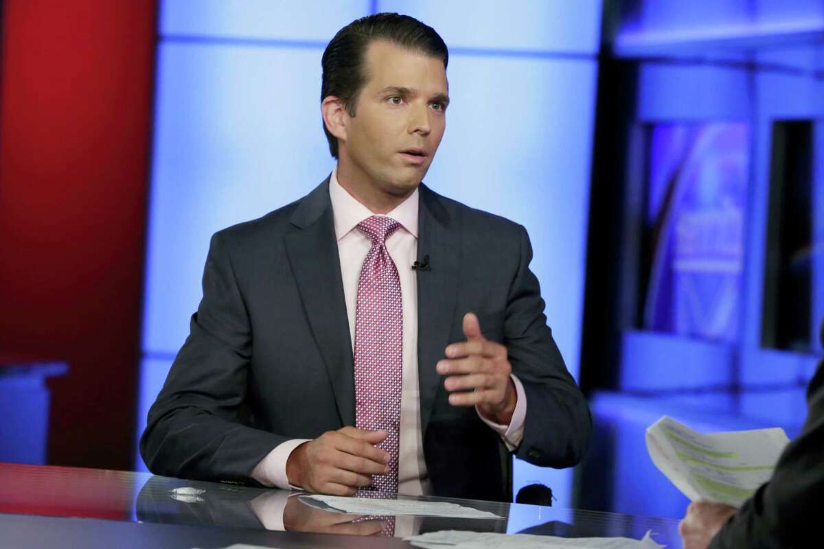 In this photo taken July 11, 2017, Donald Trump Jr. is interviewed by host Sean Hannity on his Fox News Channel television program, in New York. A Russian-American lobbyist says he attended a June 2016 meeting with President Donald Trump’s son, marking another shift in the account of a discussion that was billed as part of a Russian government effort to help the Republican’s White House campaign.