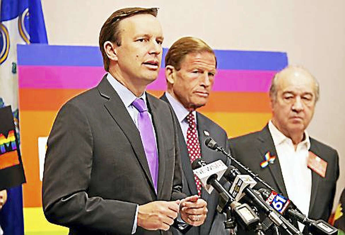 U.S. Sen. Chris Murphy with U.S. Sen. Richard Blumenthal in background