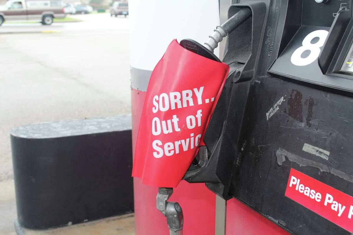 A plastic bag covers the gas pump at the Brookshire Bros. station in Cleveland on Friday. Limited fuel was on hand as local residents depleted many stores' reserves in anticipation of Hurricane Harvey.