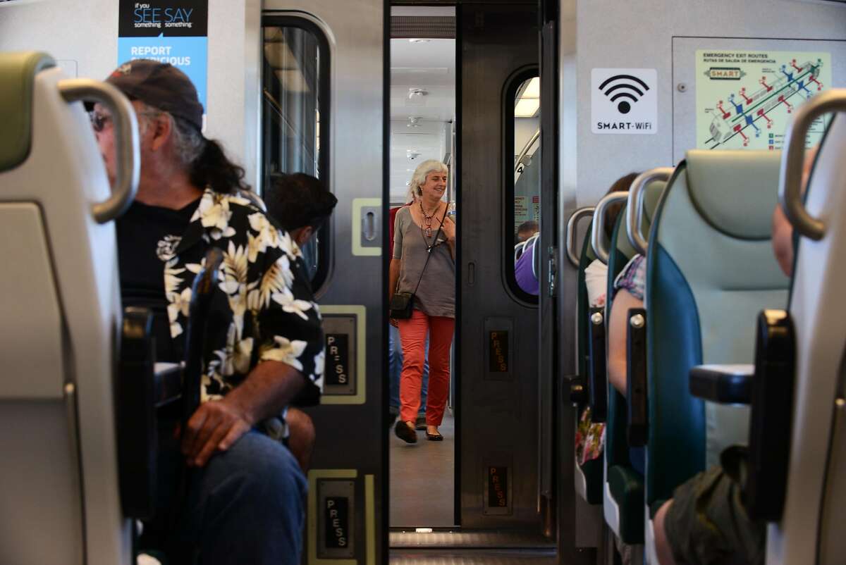 Passengers are able to move between some cars through a set of metal sliding doors. This was the first day of SMART train service departing from the Sonoma County Airport station Friday at 12:49 p.m. in Santa Rosa, California. Rides are free today. August 25, 2017.