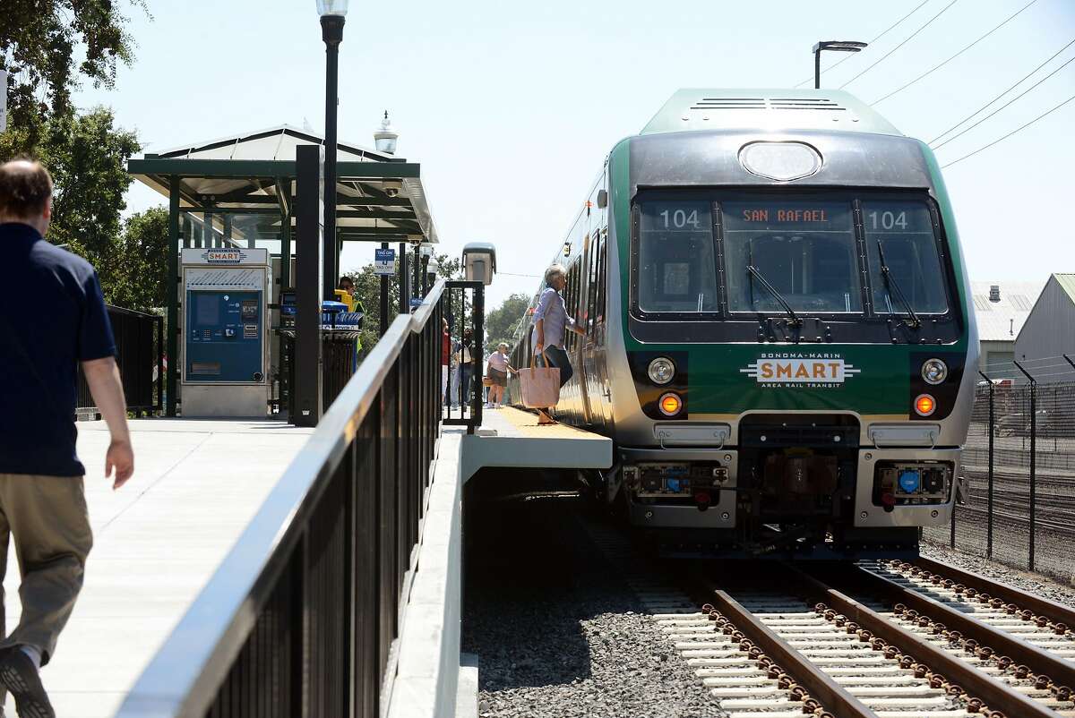 A few last minute passengers boarding on the first day of SMART train service departing from the Sonoma County Airport station Friday at 12:49 p.m. in Santa Rosa, California. Rides are free today. August 25, 2017.