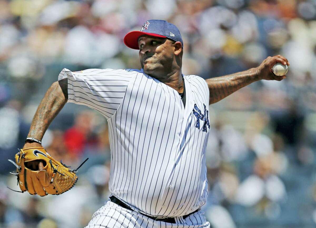 New York Yankees starting pitcher CC Sabathia delivers during the first inning of a baseball game against the Toronto Blue Jays at Yankee Stadium in New York, Tuesday. Sabathia struggled in his return from the diabled list as the Blue Jays beat the Yankees.