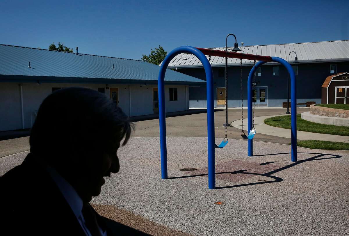 Michael Miller, Director of San Joaquin County�s Human Services Agency stands near a swing set during a Chronicle tour of Mary Graham Children's Shelter April 21, 2017 in French Camp, Calif.