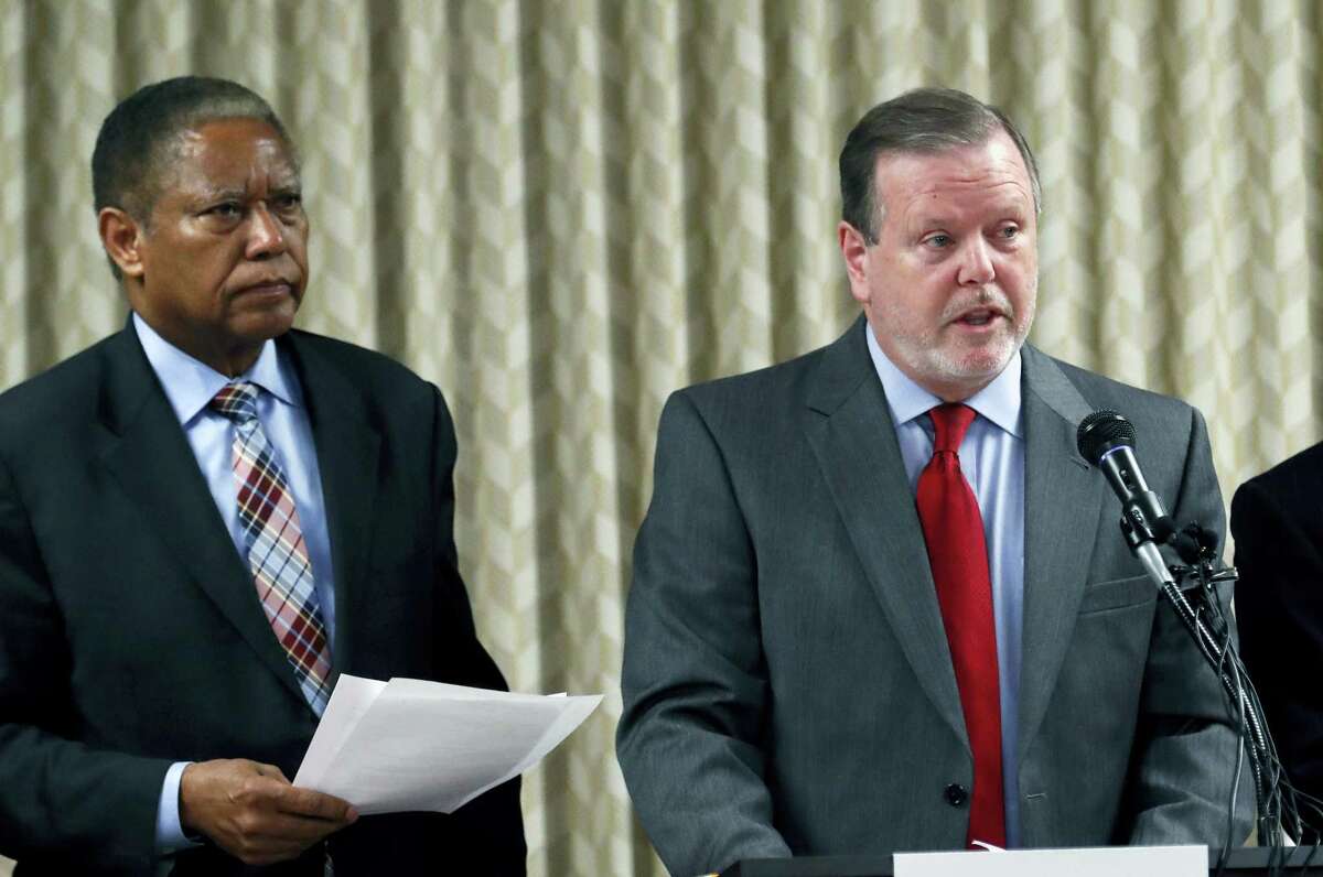 North Carolina Senate President pro tem Phil Berger, right, and Senate Democratic leader Sen. Dan Blue announce a bill to replace the controversial HB2 or ‘bathroom bill’ at the North Carolina General Assembly on Thursday, March 30, 2017. The bill passed the committee and now goes to the full Senate.