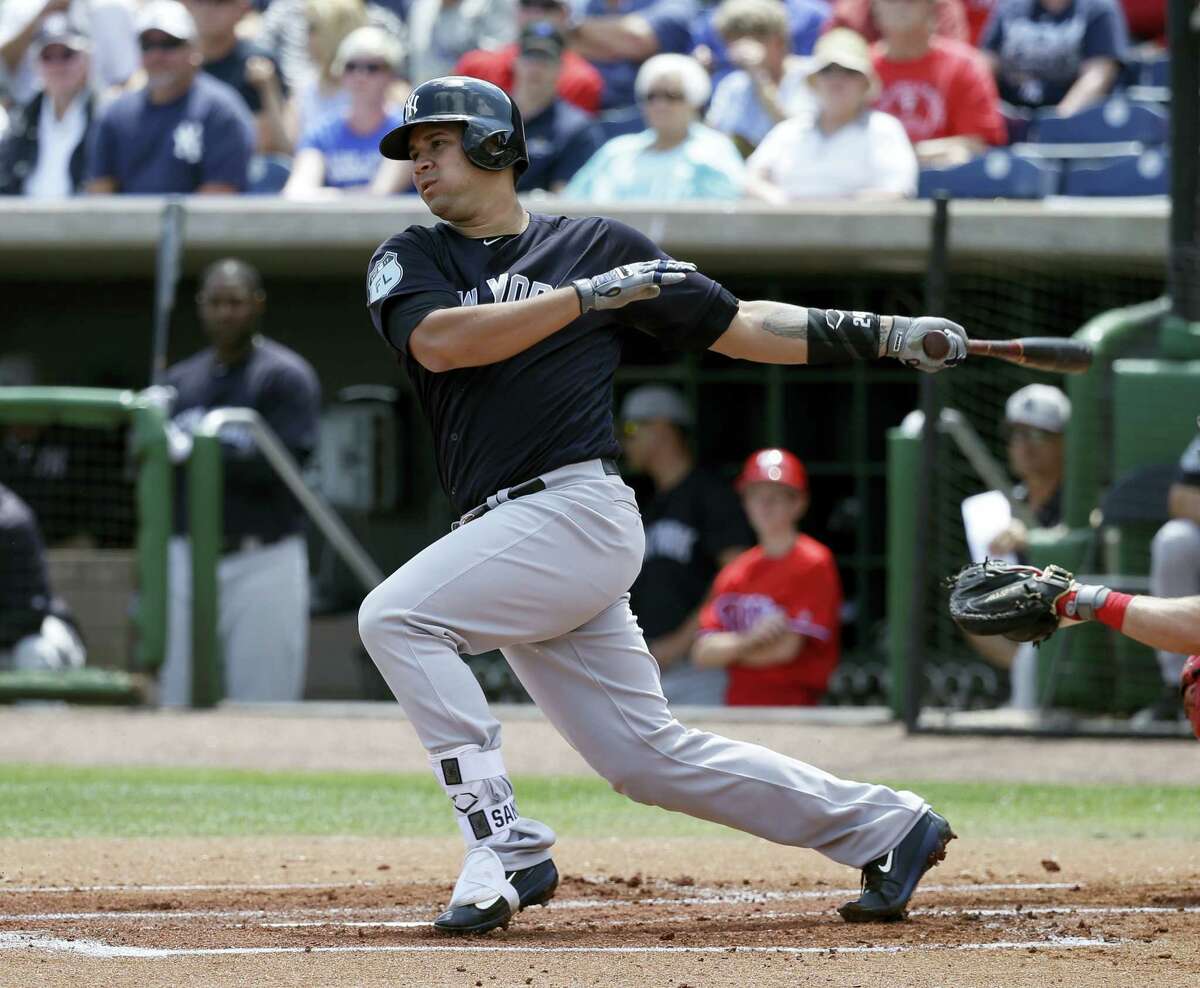 The Yankees’ Gary Sanchez bats against the Phillies during a spring training game.