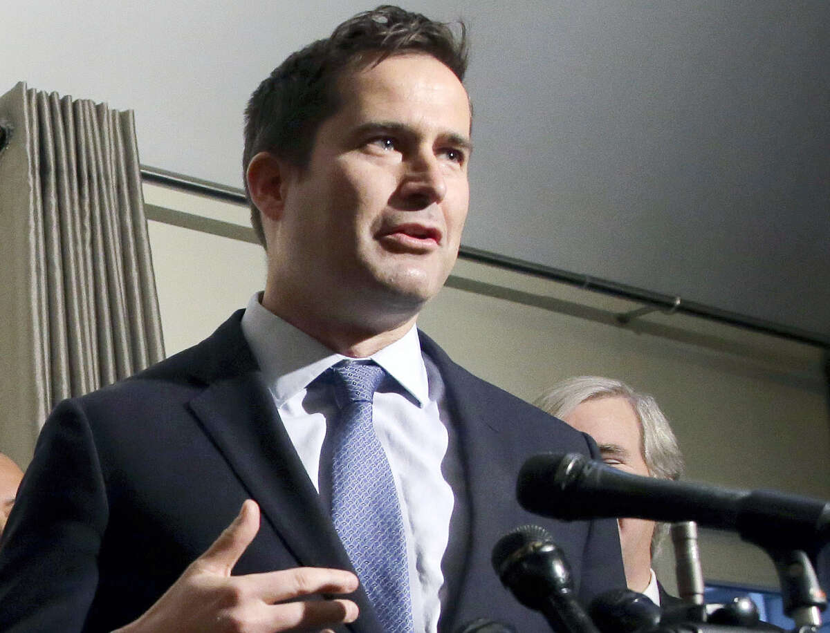 In this Dec. 13, 2016 photo, Rep. Seth Moulton, D-Mass., speaks during an event in Beverly, Mass. Democrats hope to enlist military veterans in another type of fight — for majority control of the House.
