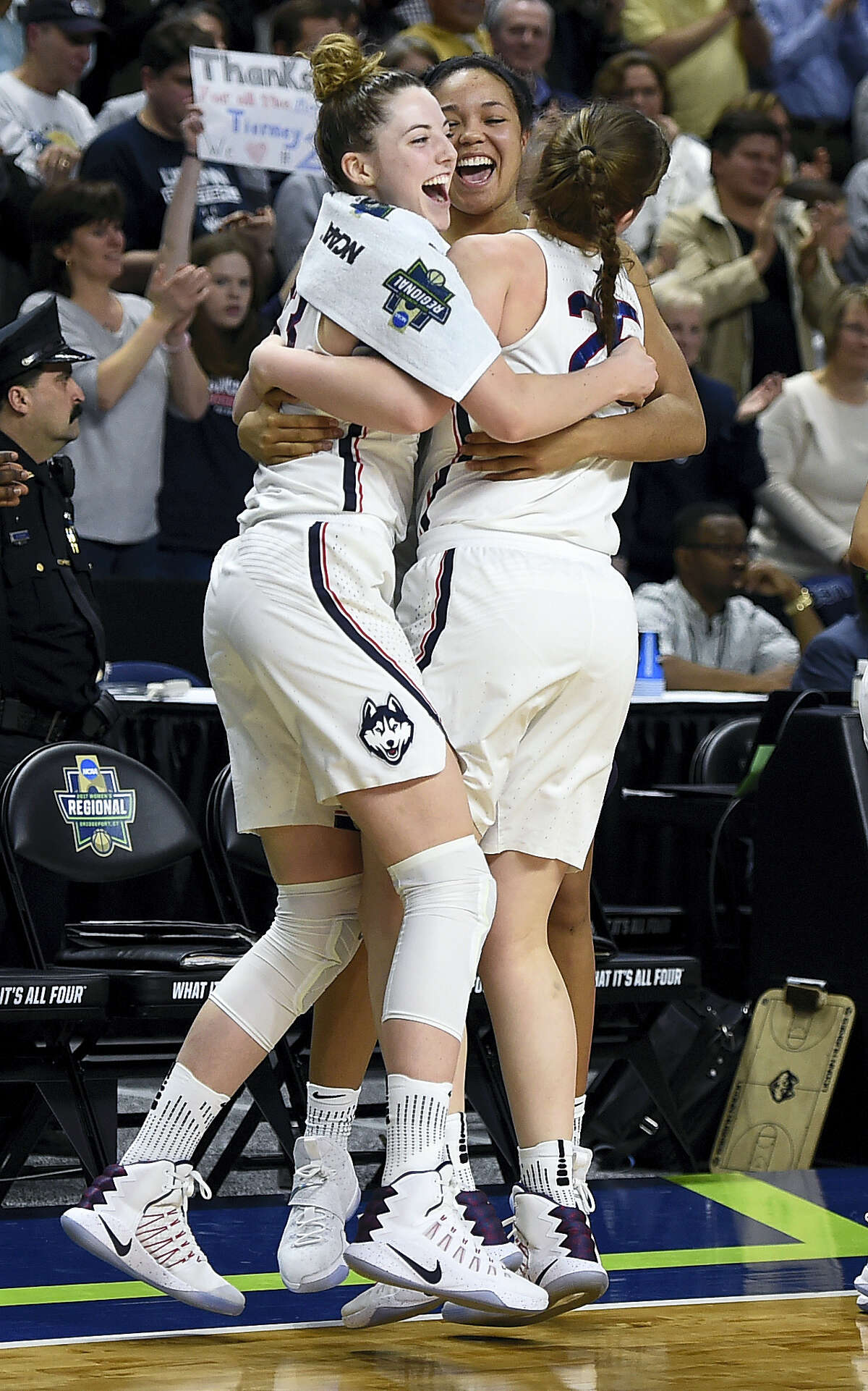 From left, UConn’s Katie Lou Samuelson, Napheesa Collier and Kyla Irwin celebrate as the clock winds down on Monday.