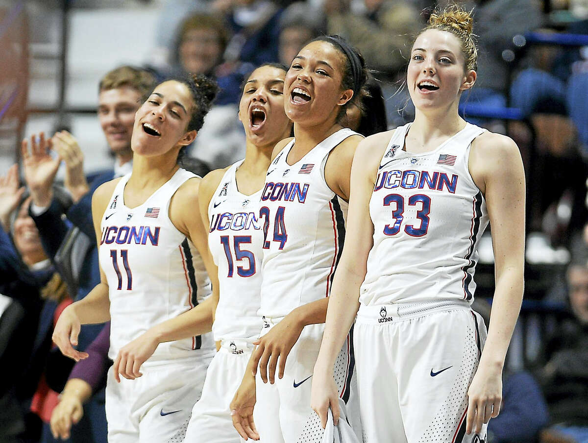 UConn’s Napheesa Collier, second from right, and Katie Lou Samuelson, right, are 48 points shy of becoming the single-season highest-scoring tandem in the history of the UConn women’s basketball program.