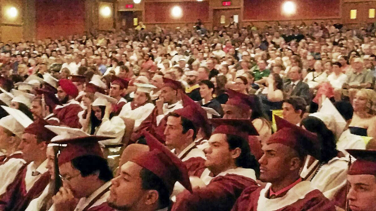 Register Citizen file photo Students participate in the graduation ceremonies for Torrington High School at the Warner Theatre in 2015.