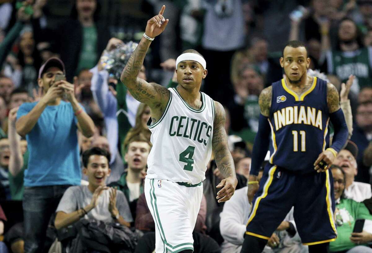 Boston Celtics’ Isaiah Thomas (4) reacts beside Indiana Pacers’ Monta Ellis (11) after scoring during the fourth quarter of an NBA basketball game in Boston, Wednesday, March 22, 2017. The Celtics won 109-100. (AP Photo/Michael Dwyer)