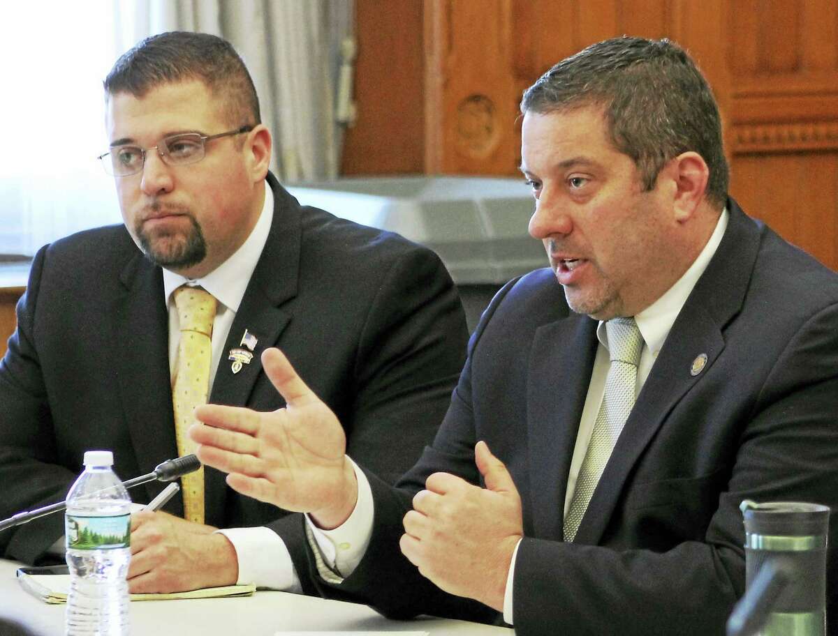 State Reps. Brian Ohler, R-Canaan, and Jay Case, R-Winsted, discuss sober home legislation at a recent roundtable.