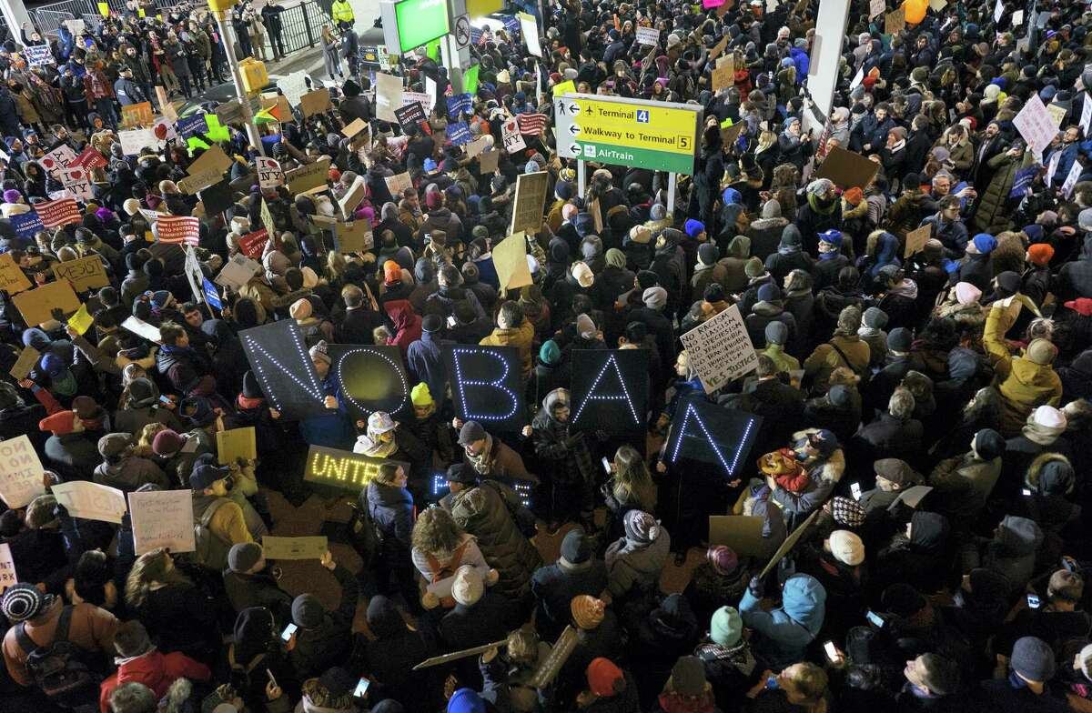 Protesters assemble at John F. Kennedy International Airport in New York, Saturday after earlier in the day two Iraqi refugees were detained while trying to enter the country. On Friday, Jan. 27, President Donald Trump signed an executive order suspending all immigration from countries with terrorism concerns for 90 days. Countries included in the ban are Iraq, Syria, Iran, Sudan, Libya, Somalia and Yemen, which are all Muslim-majority nations.