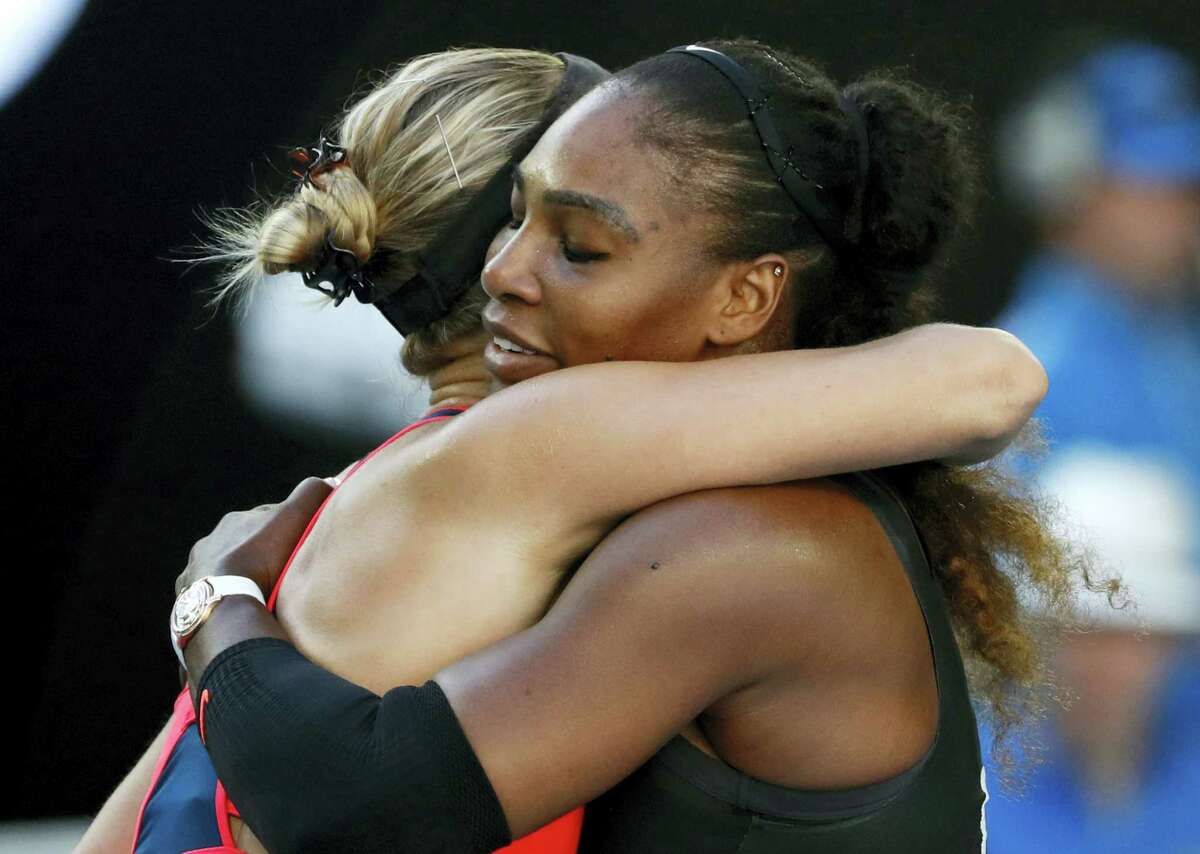 United States’ Serena Williams, right, embraces Croatia’s Mirjana Lucic-Baroni, after winning their semifinal at the Australian Open tennis championships in Melbourne, Australia on Jan. 26, 2017.