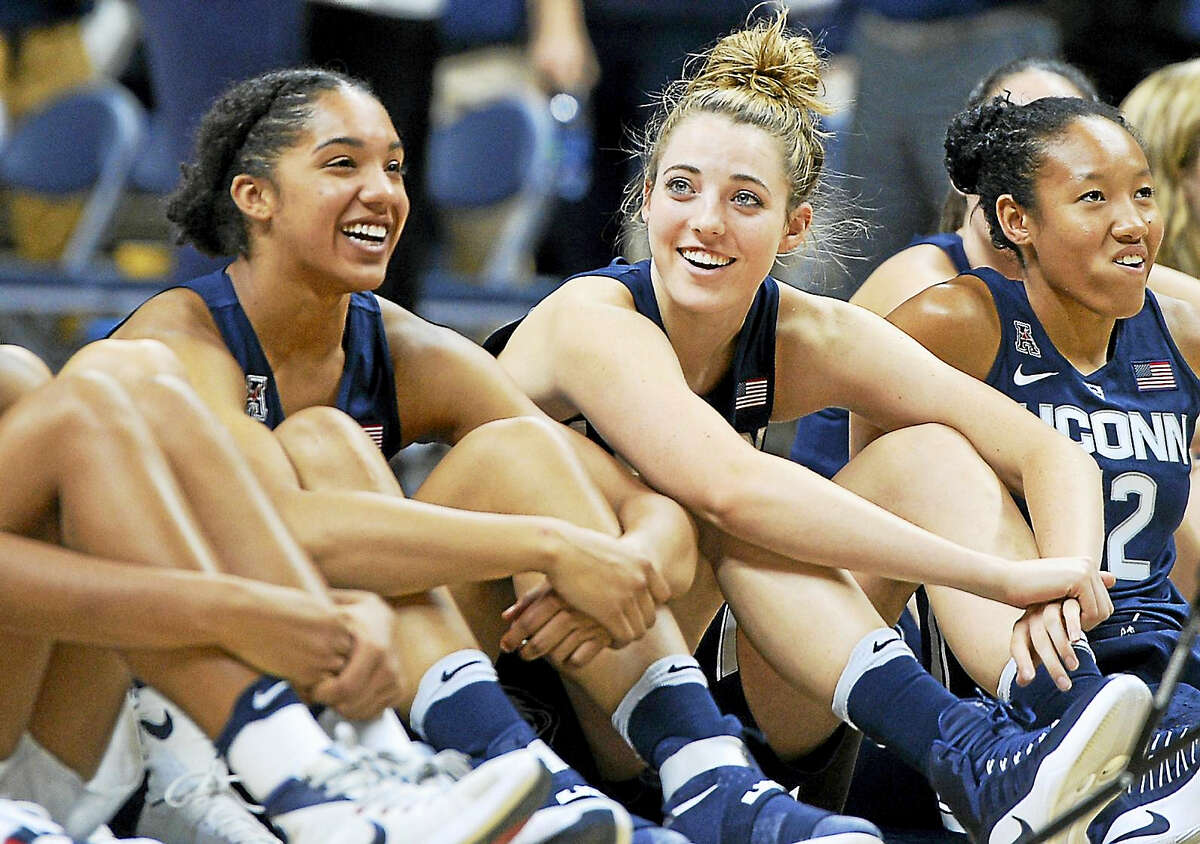 From left, UConn’s Gabby Williams, Katie Lou Samuelson and Saniya Chong sit together.