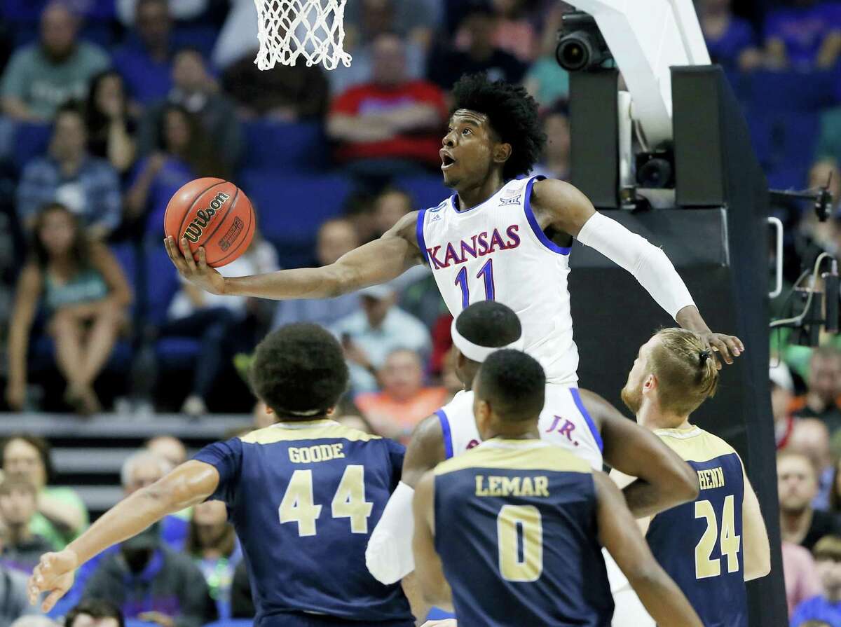 Kansas’ Josh Jackson goes up for a shot in the first half of the Jayhawks’ win over UC Davis on Friday.