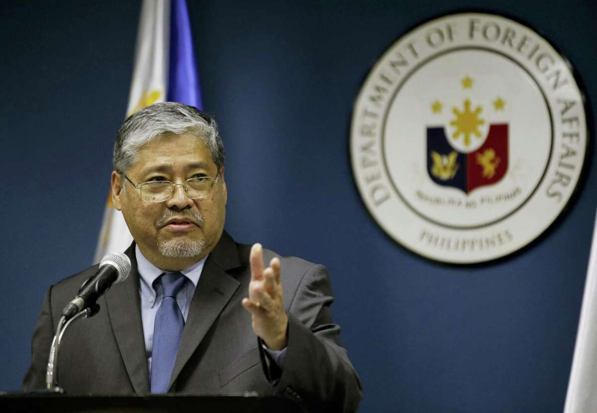 Acting Philippine Foreign Secretary Enrique Manalo answers questions from reporters in Manila, Philippines, Thursday, March 16, 2017. Australia urged Southeast Asian nations and China to conclude a legally-binding code of conduct in the South China Sea as soon as possible, voicing concern Thursday to the scale of reclamation and construction by China in the disputed territory. Manalo said in a separate news conference that diplomats from ASEAN member states and China were progressing in efforts to draft a framework of the code although he refused to provide details.