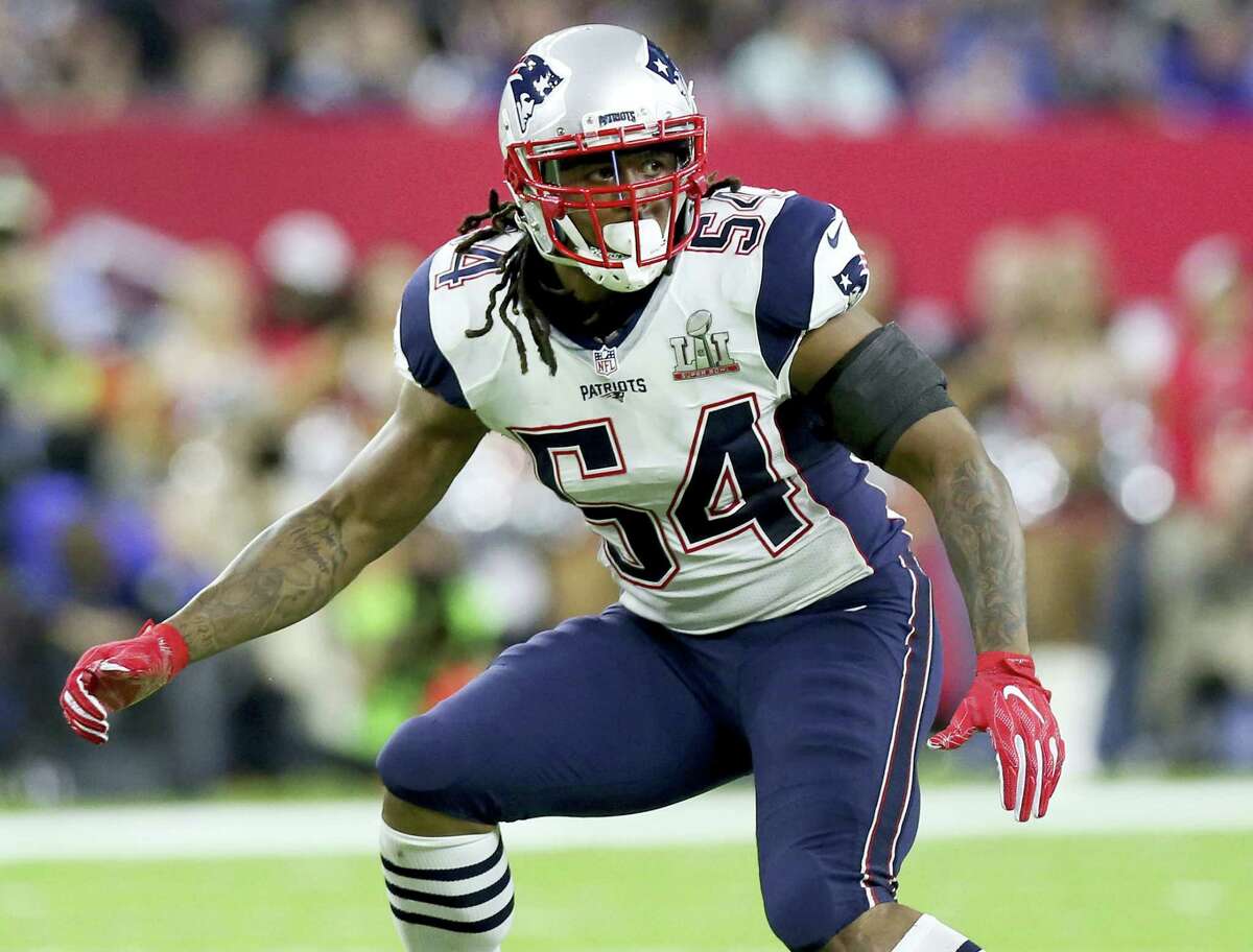 FILE - In this Feb. 5, 2017, file photo, New England Patriots Dont’a Hightower folllows the action during NFL football’s Super Bowl 51 against the Atlanta Falcons in Houston. A person with direct knowledge of the situation says Hightower has visited the New York Jets. Hightower, one of the most coveted players in free agency this year, met with the Jets on Sunday, March 12, 2017 and Monday, March 13, according to the person who spoke to The Associated Press on condition of anonymity because the team had not announced the visit. AP Photo/Gregory Payan, File)