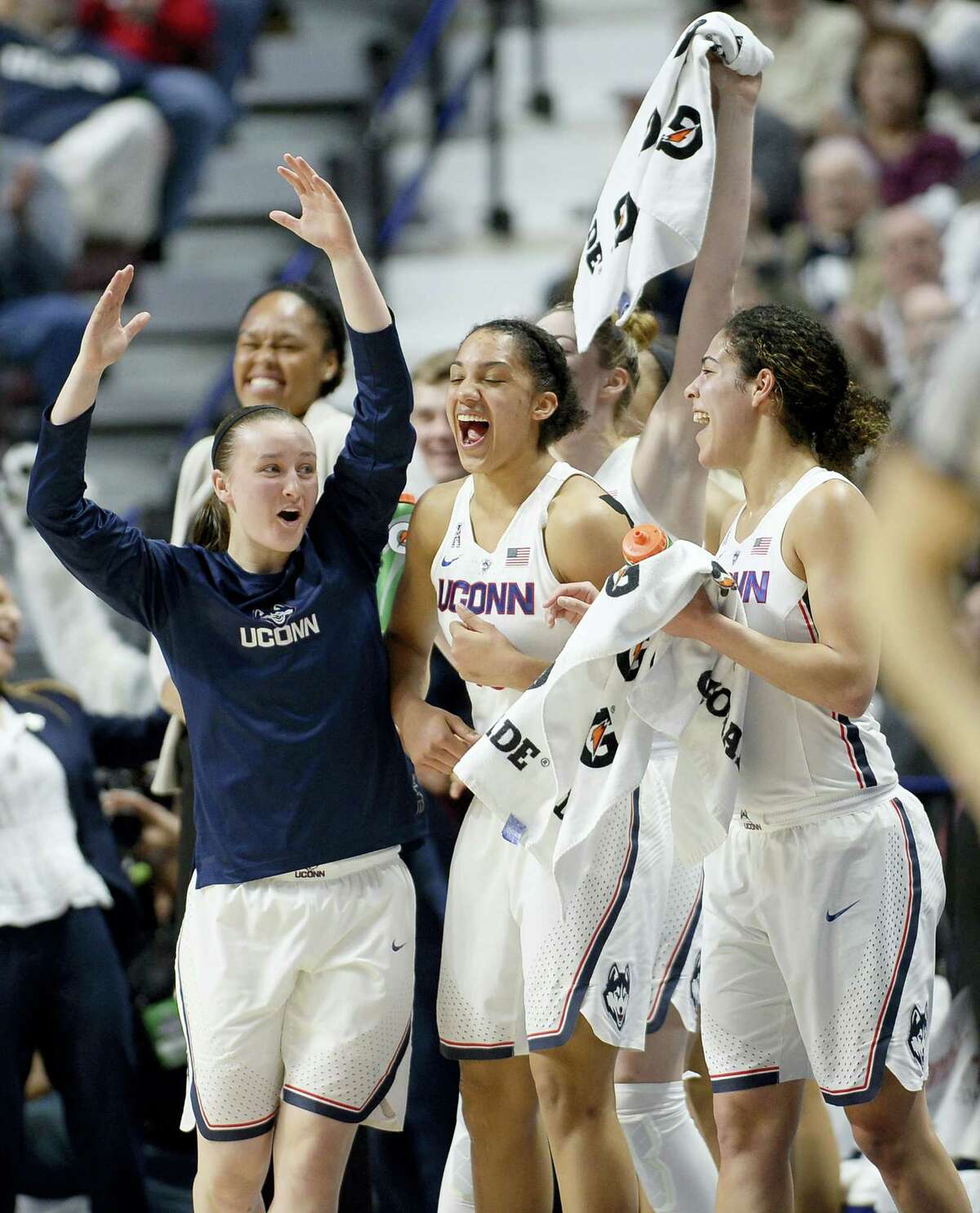 Connecticut’s Tierney Lawlor, left, celebrates with Gabby Williams, center, and Kia Nurse, right, during the second half of an NCAA college basketball game against South Florida in the American Athletic Conference tournament finals at Mohegan Sun Arena on March 6, 2017 in Uncasville, Conn.