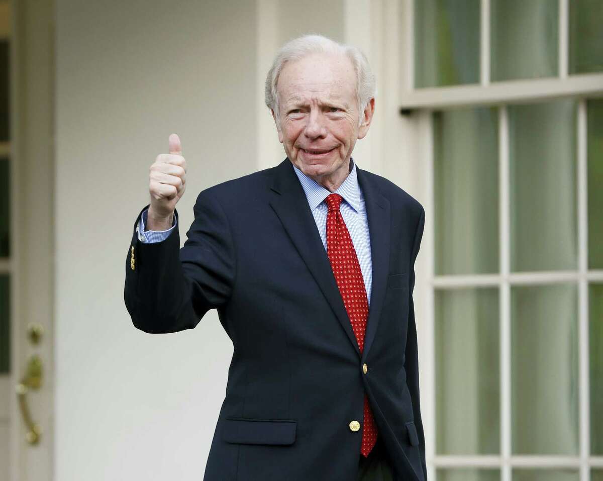 Former Connecticut Sen. Joe Lieberman gives a ‘thumbs-up’ as he leaves the West Wing of the White House in Washington, Wednesday, May 17, 2017. The White House says President Donald Trump will be interviewing four potential candidates to lead the FBI. (AP Photo/Pablo Martinez Monsivais)