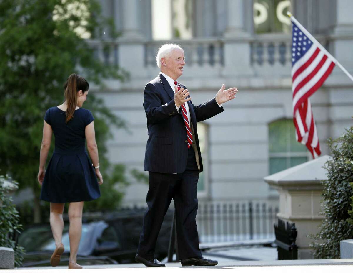 Former Oklahoma Gov. Frank Keating stops to answers questions from members of the media as he leaves the West Wing of the White House in Washington, Wednesday, May 17, 2017. The White House says President Donald Trump will be interviewing four potential candidates to lead the FBI. (AP Photo/Pablo Martinez Monsivais)