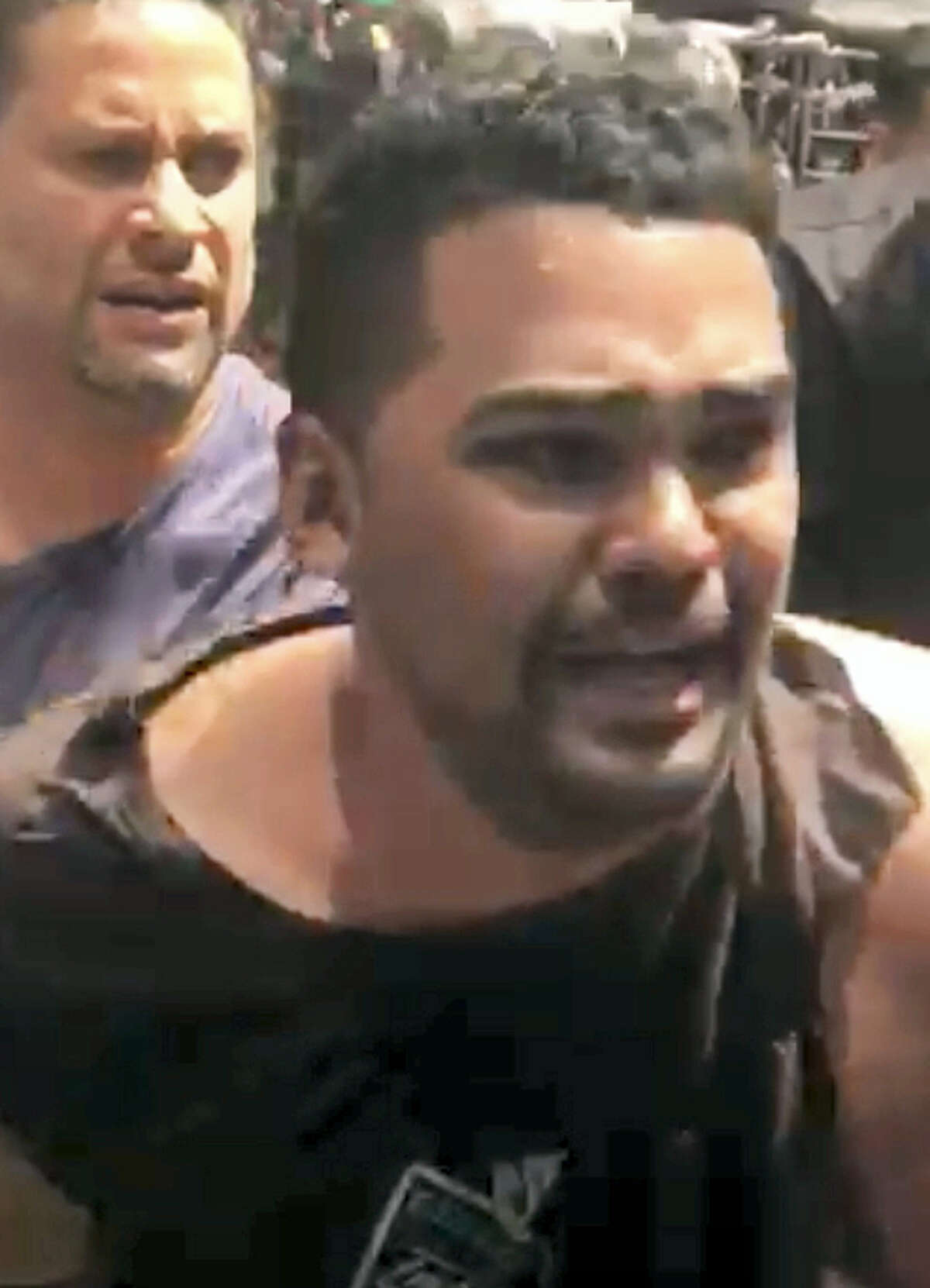 In this image made from video provided by Oscar Navarro Reyes, Richard Rojas is arrested after a fatal automobile accident on New York City’s Times Square, Thursday, May 18, 2017. Authorities and witnesses said Rojas drove his car the wrong way up a Times Square street and plowed into pedestrians on the sidewalk.