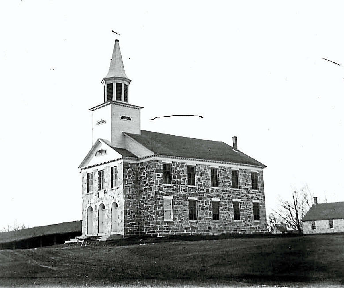 The Stone Church of the First Ecclesiastical Society of New Preston at 100 New Preston Hill Road. Photograph by Joseph West in 1899.