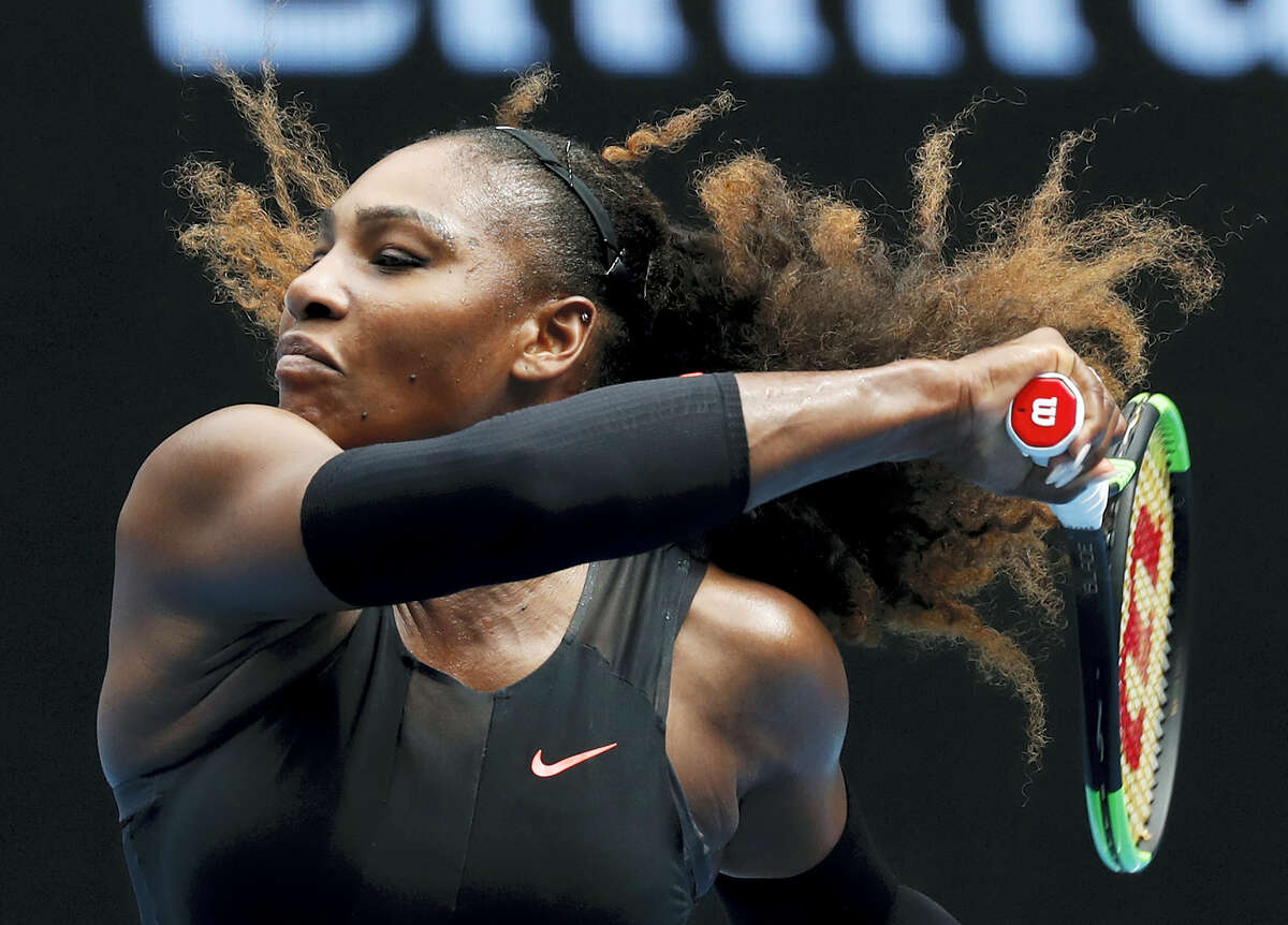 United States’ Serena Williams makes a forehand return to Barbora Strycova of the Czech Republic during their fourth round match at the Australian Open tennis championships in Melbourne, Australia on Jan. 23, 2017.