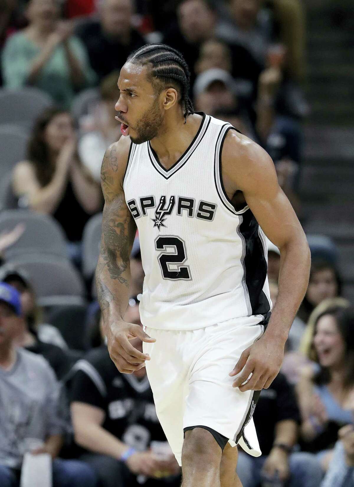 San Antonio Spurs forward Kawhi Leonard (2) reacts after scoring against the Atlanta Hawks during the second half of an NBA basketball game, on March 13, 2017 in San Antonio. Spurs won 107-99.