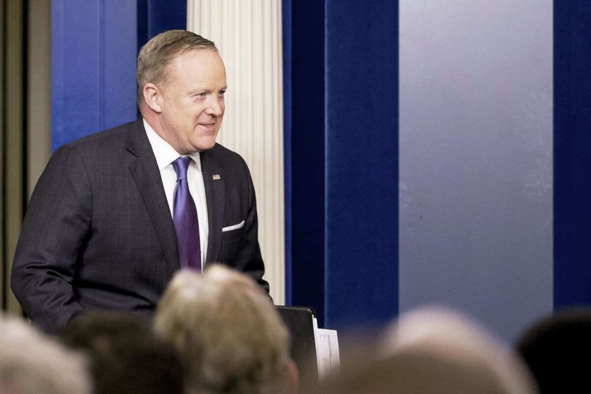 White House press secretary Sean Spicer arrives for the daily press briefing at the White House in Washington, Monday, March 13, 2017.
