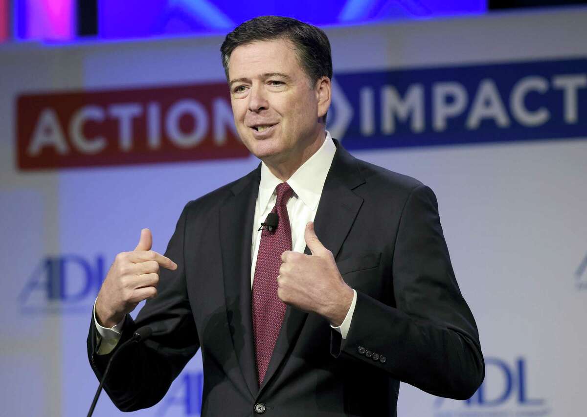 In this May 8, 201 photo, then-FBI Director James Comey speaks to the Anti-Defamation League National Leadership Summit in Washington. The White House is disputing a report that President Donald Trump asked Comey to shut down an investigation into ousted national security adviser Michael Flynn.
