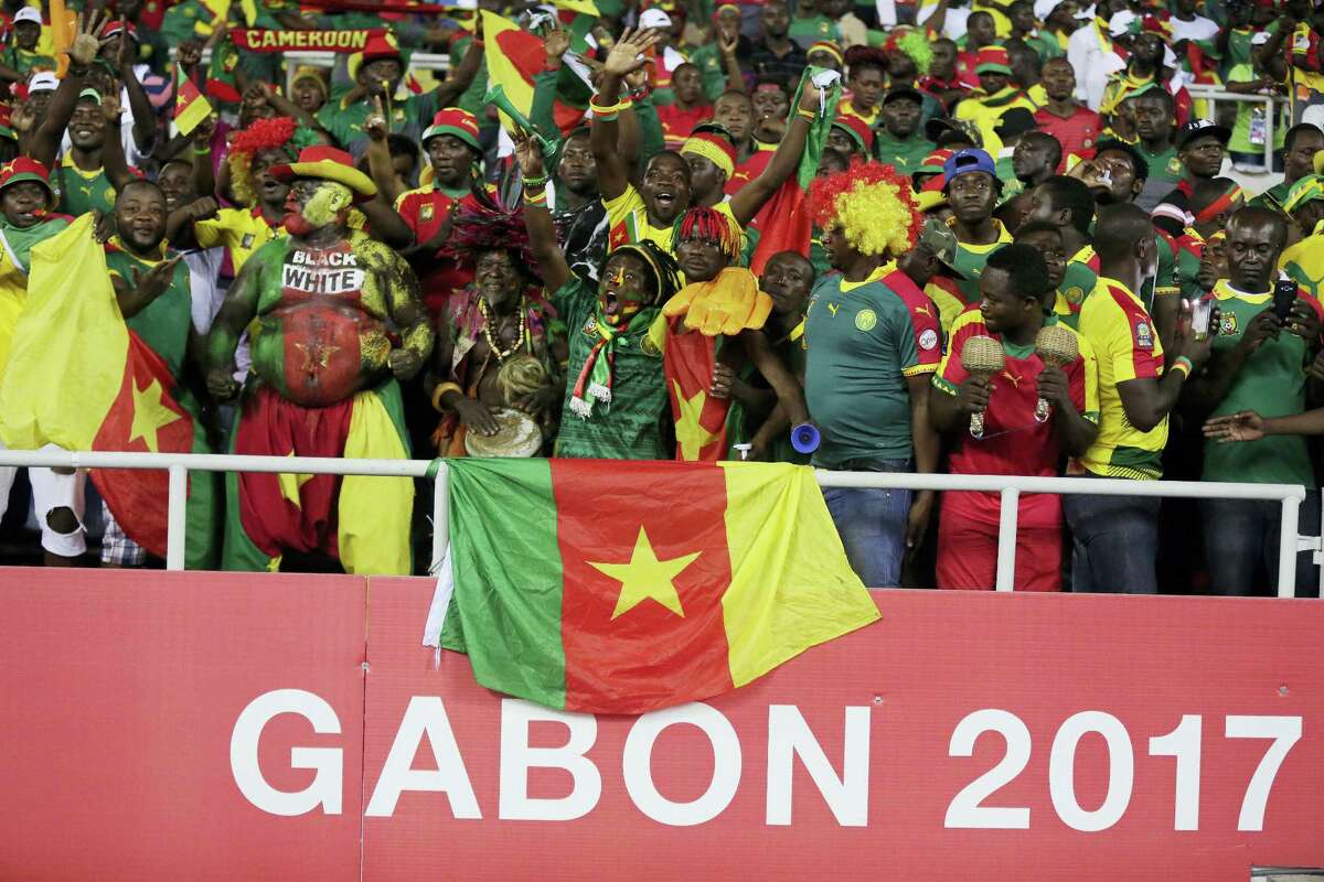 Cameroon’s supporter chant ahead of the African Cup of Nations Group A soccer match between Cameroon and Gabon at the Stade de l’Amitie, in Libreville, Gabon on Jan. 22, 2017.