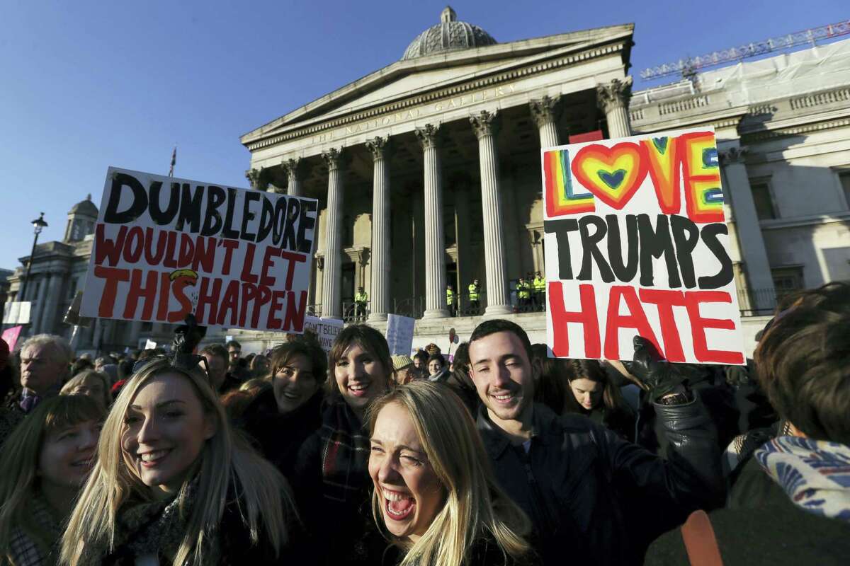 Demonstrators take part in the Women’s March in Trafalgar Square, central London, following the Inauguration of U.S. President Donald Trump in London, Saturday Jan. 21, 2016. The march is being held in solidarity with the Women’s March in Washington and other cities worldwide, advocating women’s rights and opposing Donald Trump’s U.S. presidency.