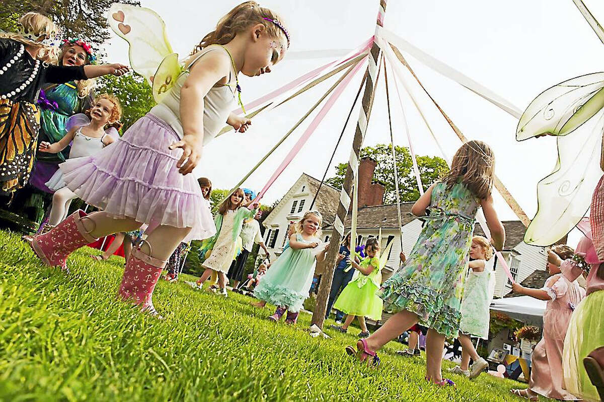 “Fairies” dance around a May pole during a previous festival at the Bellamy-Ferriday House & Garden in Bethlehem. This year’s Fairy Festival is set for Saturday.