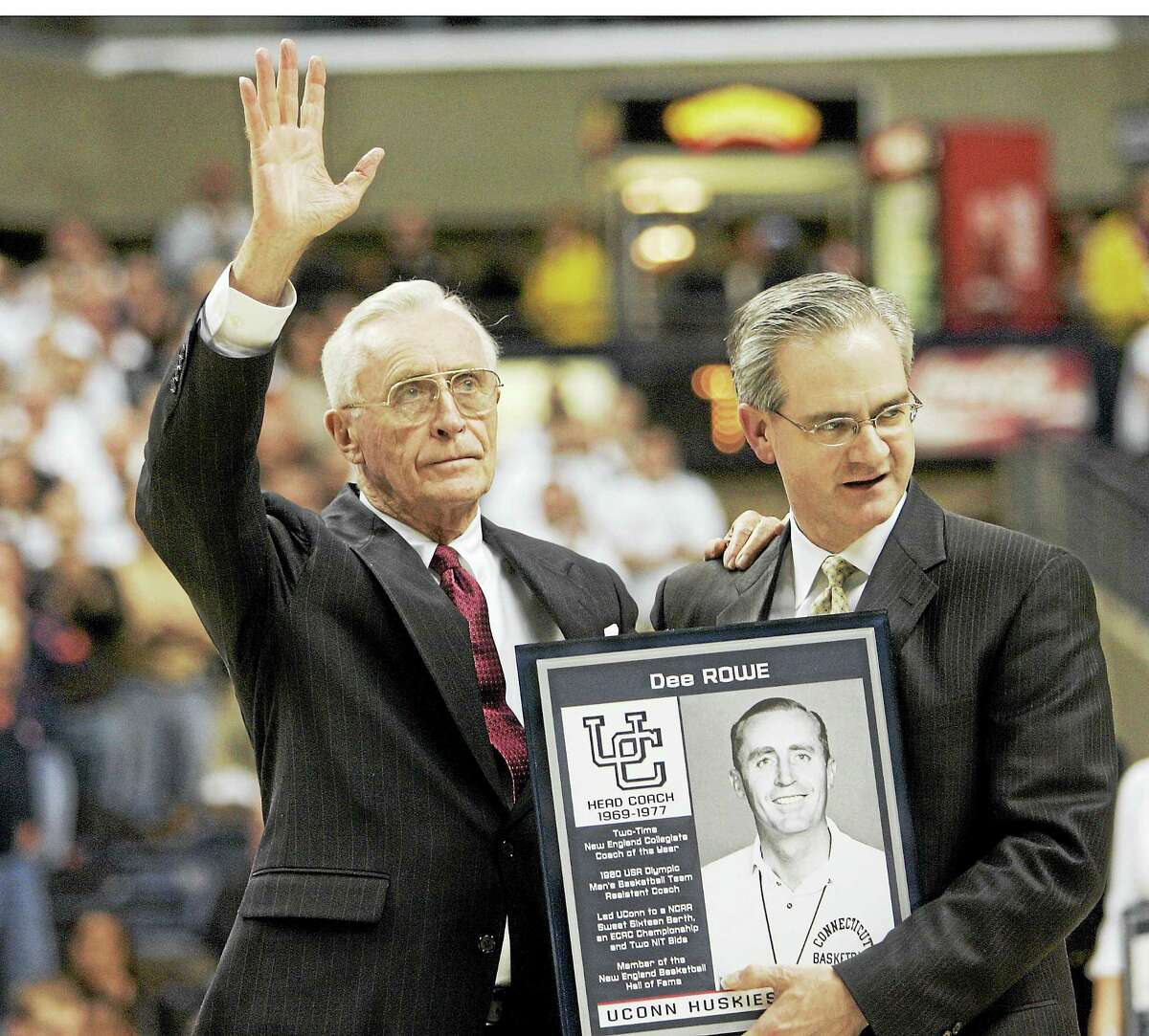 Former UConn head coach Dee Rowe waves to the crowd during a 2007 ceremony.