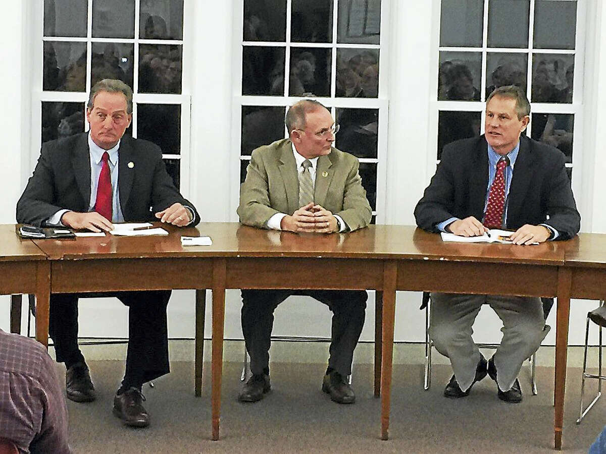 From left, state Rep. John Piscopo (R-76th), Rep. Henri Martin (R-31st), and Sen. Kevin Witkos (R-8th), discuss a question from a resident during the meeting.
