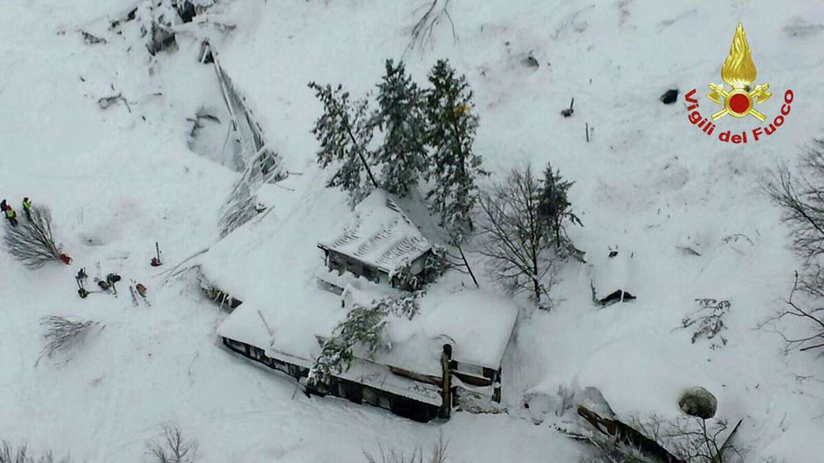 An aerial view of the Rigopiano Hotel hit by an avalanche in Farindola, Italy, early Thursday, Jan. 19, 2017. A hotel in the mountainous region hit again by quakes has been covered by an avalanche, with reports of dead. Italian media say the avalanche covered the three-story hotel in the central region of Abruzzo, on Wednesday evening.