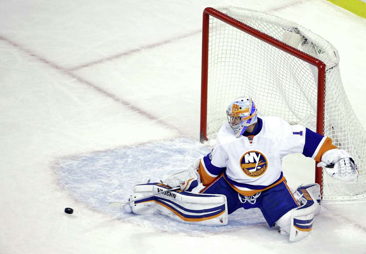 Islanders goalie Thomas Greiss guards the net in the first period on Monday.
