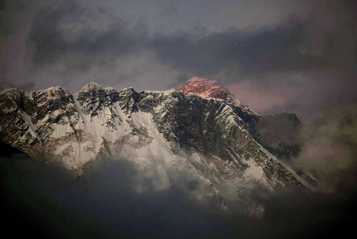 In this Oct. 27, 2011 photo, the last light of the day sets on Mount Everest as it rises behind Mount Nuptse as seen from Tengboche, in the Himalaya’s Khumbu region, Nepal. Famed Swiss climber Ueli Steck was killed Sunday, April 30, 2017, in a mountaineering accident near Mount Everest in Nepal, expedition organizers said. Mingma Sherpa of the Seven Summit Treks said Steck was killed at Camp 1 of Mount Nuptse.