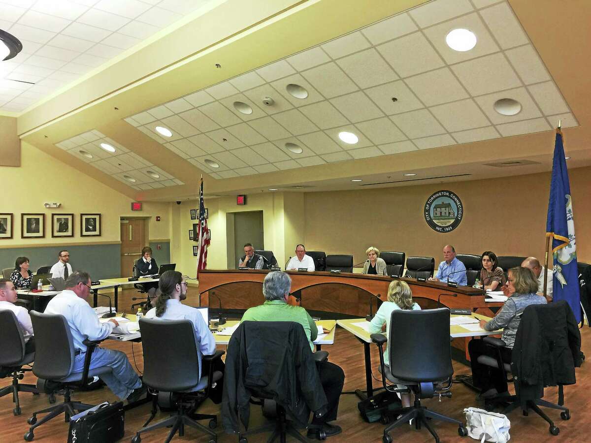 The Board of Finance and City Council discuss the proposed city budget Monday evening.