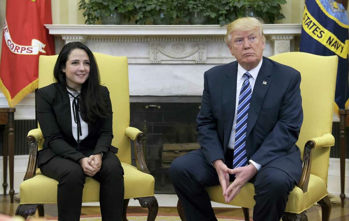 President Donald Trump meets with Aya Hijazi, an Egyptian-American aid worker, in the Oval office of the White House in Washington, Friday, April 21, 2017. Hijazi, an Egyptian-American charity worker, was freed after nearly three years of detention in Egypt returning to the U.S., Thursday, April 20, 2017.