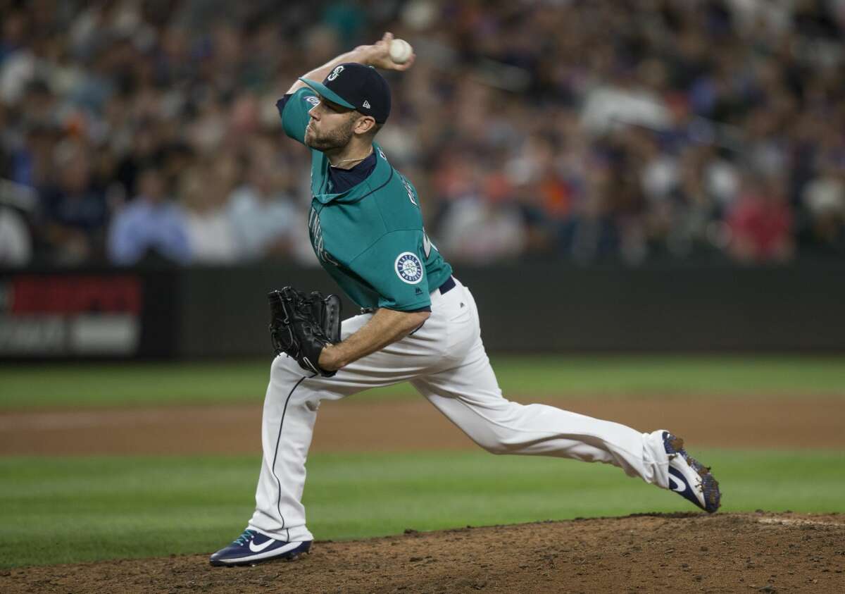 Reliever David Phelps of the Seattle Mariners delivers a pitch during an interleague game against the New York Mets at Safeco Field on July 28, 2017 in Seattle, Washington.
