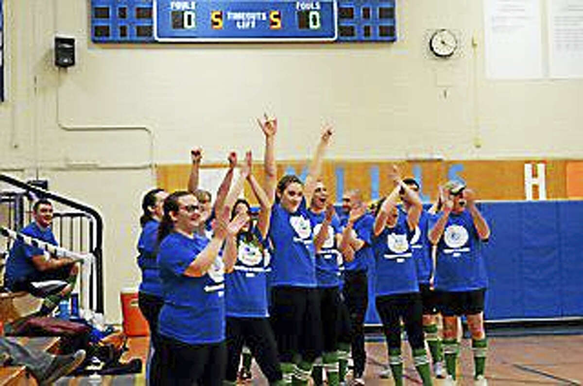 Carolyn Nevin, a sophomore at Lewis S. Mills High School, organized a Coaches vs.Cancer Student vs. Faculty volleyball game to raise donations for her local Relay for Life Team, iCure. The students took the match, winning two of three games, and the event raised $2,500. Carolyn and her team will be participating with over 200 teams from area schools in the annual Relay For Life Cancer Walk on Saturday, May 20th at the Farmington Polo Grounds. Photos: TGN_2957 is Team iCure TGN_3050 is the staff team celebrating a win TGN_3676 is the student team celebrating in front of a large crowd at Mills PVR:184410