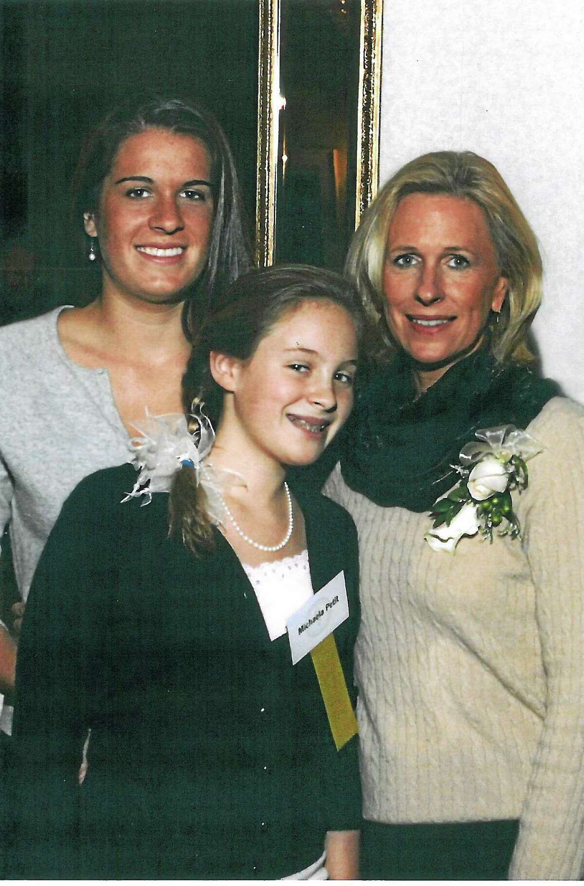 Hayley, left, and Michaela Petit and their mother, Jennifer Hawke-Petit