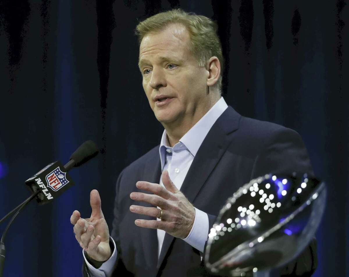 NFL Commissioner Roger Goodell answers questions during a news conference. A small group of former players want the NFL to drop marijuana from its listed of banned substances, a step that is long overdue to keep players from being needlessly fined and suspended for a recreational pursuit that is certainly no more dangerous than drinking alcohol.