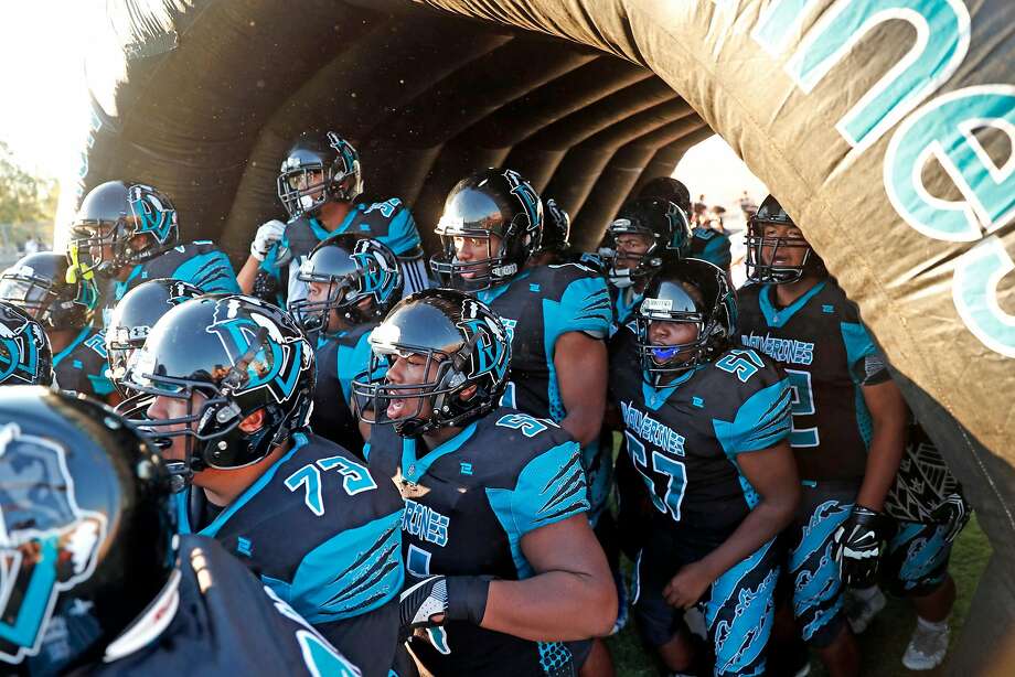 Deer Valley High School football team takes the field before season opener against Monte Vista in Antioch, Calif. on Friday, August 25, 2017. Photo: Scott Strazzante / The Chronicle 2017