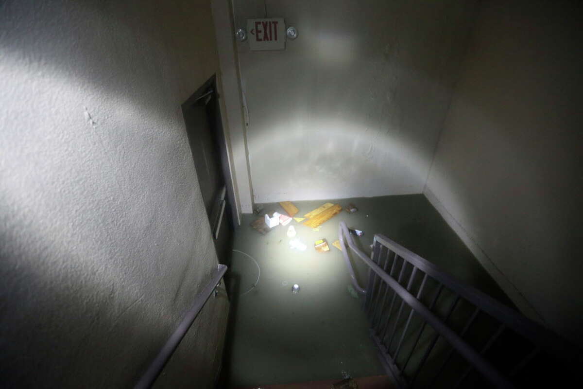 Hurricane Harvey storm surge waters fill the ground floor emergency exit stairwell Saturday morning, Aug. 27, 2017 at the Port Lavaca Holiday Inn Express. Hurricane Harvey made landfall late Friday night about 50 miles away in Rockport, Texas as a Category 4 storm.