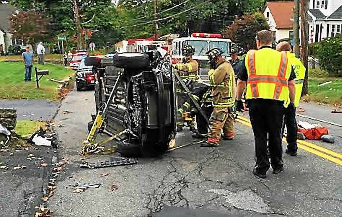 Woman rescued as rollover crash briefly closes road in Torrington