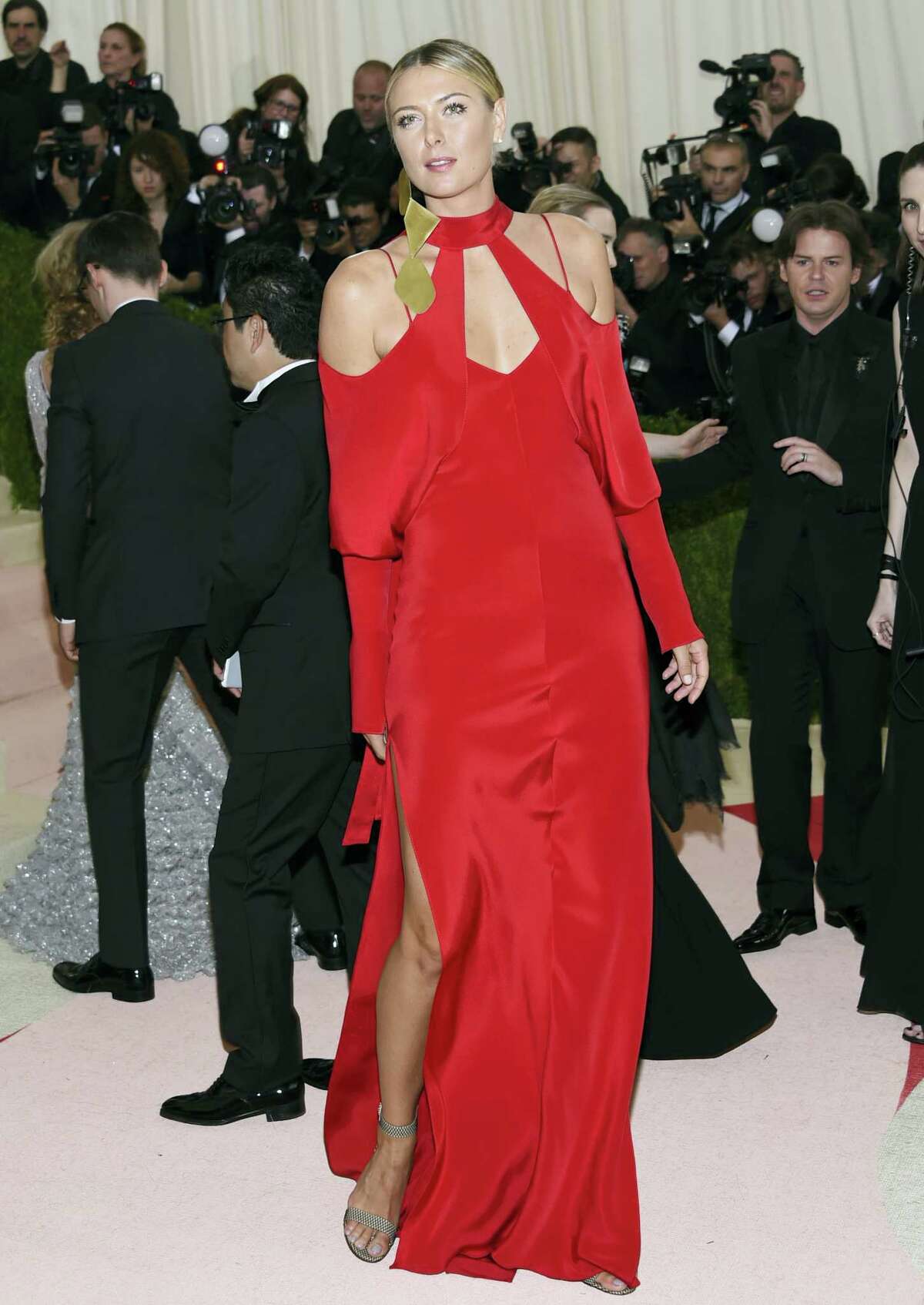 In this Monday, May 2, 2016 photo, Maria Sharapova arrives at The Metropolitan Museum of Art Costume Institute Benefit Gala, celebrating the opening of “Manus x Machina: Fashion in an Age of Technology” in New York. Sharapova has been suspended for two years by the International Tennis Federation for testing positive for meldonium at the Australian Open.